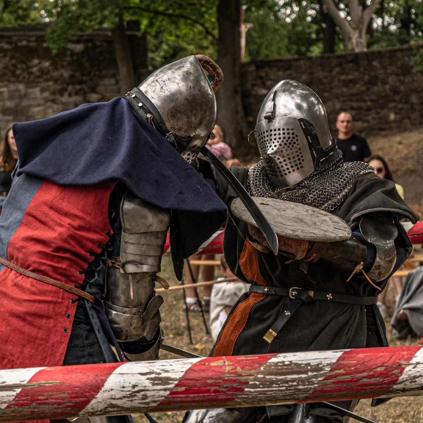 Sword exchange between two armoured fighters